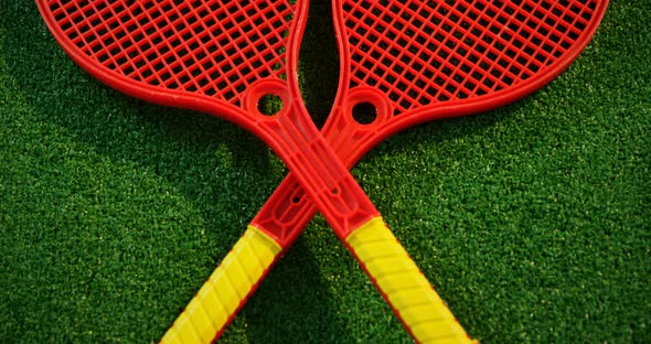 Tennis balls and racket in court 4k alt