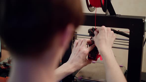 Man Creating 3d Model on Printer