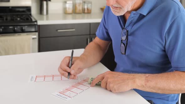 Mature man playing the lottery alt