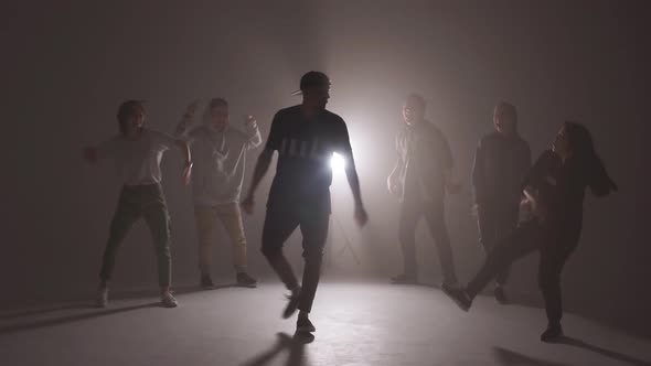 Group of Young Hip-hop Dancers Performing on the Stage alt