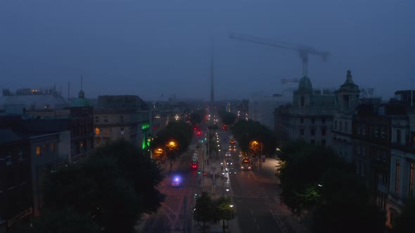 Forwards Fly Above Night Street in City alt