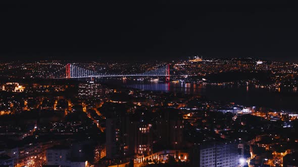 Aerial Night view of Istanbul, Bosphorus with illuminated Bridges.