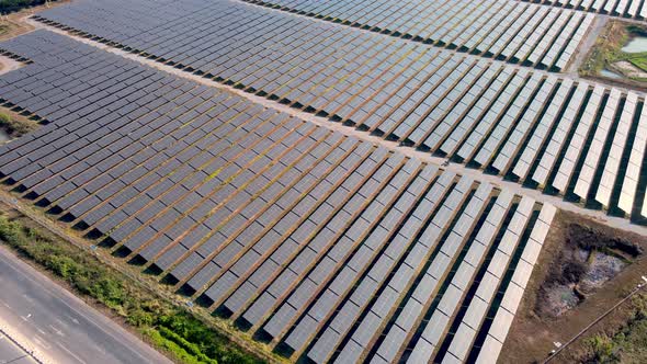 Eco Power Save Earth Solar power plant and 4K aerial view. Renewable energy. Green tech. alt