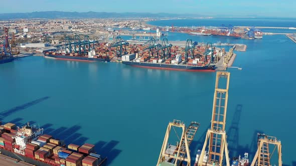 Largest Port of Spain Valencia Containers and Goods on the Quay with Cranes. alt
