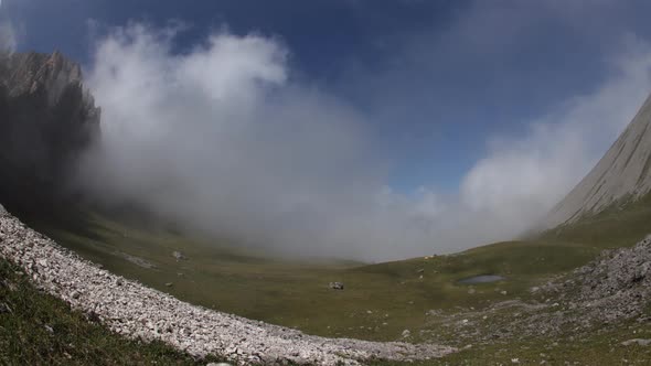 Time Lapse of Clouds Over Mountain Tops