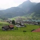 Stunning Turquoise Lake Lungerersee with Clear Water Landscape View of the Roofs of Traditional - VideoHive Item for Sale