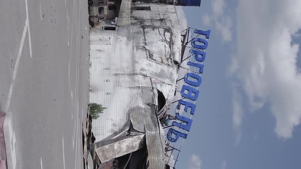 Vertical Video of a Bombed Shopping Center During the War in Bucha Ukraine alt