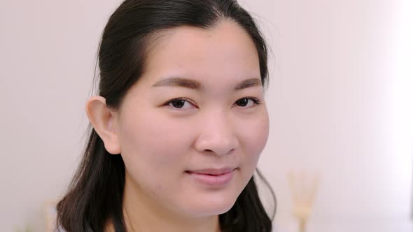 Asian women beautiful and smiling are extremely confident young face looking at camera posing alone alt