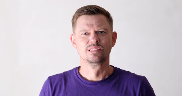 Angry Man Screams and Threatens with Knife at Camera alt