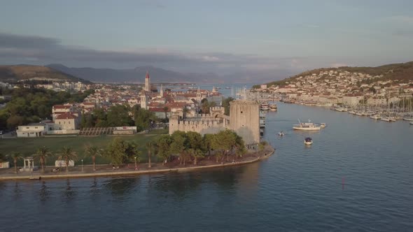 Aerial shot of Trogir historical center, Croatia. Around the old town mountains and Adriatic sea