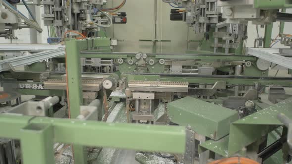 Machinery in a glass window factory alt