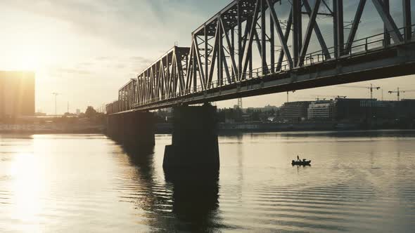 Sunrise Sun Over Railway Bridge and City River