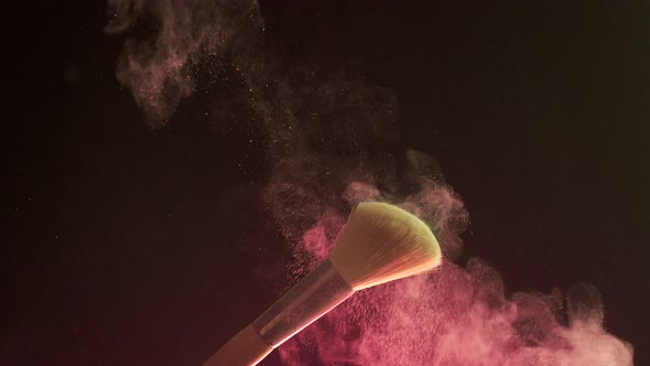 Makeup Brushes Touch Each Other on Dark Background and Small Particles of Cosmetics Slow Motion