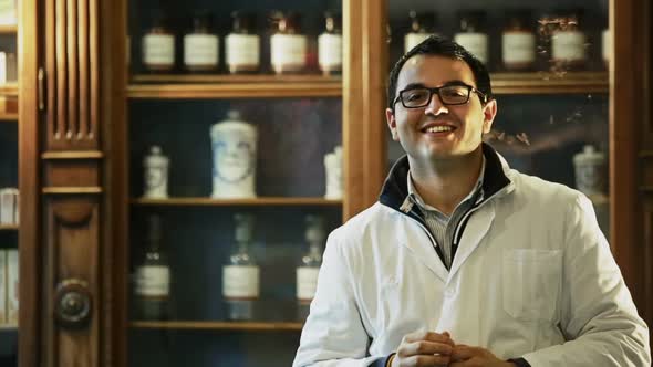 Young Pharmacist Portrait Standing in His Old Pharmacy