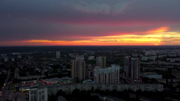 Epic aerial sunset in city residential district