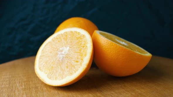 Rotating Fresh Sliced Orange Fruit