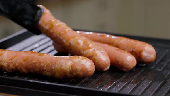 Meat Sausages Are Fried On Grill alt