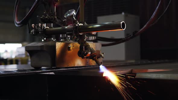 A Welding Machine is Working in the Factory Shop alt