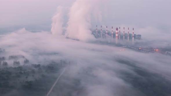 Morning time with fog and background Mae moh coal power plant.