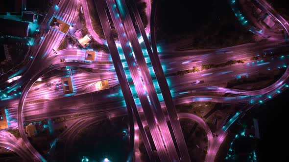 4K : Time lapse Aerial view and top view of traffic on city. Expressway with car lots alt