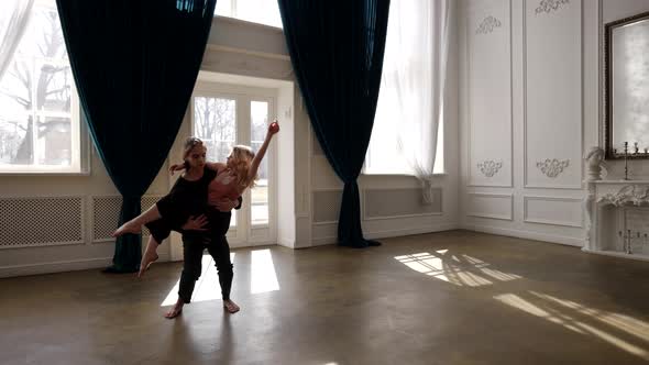 Emotional Dance of Young Loving Couple in Rehearsal Room Repetition of Contemporary Dance alt