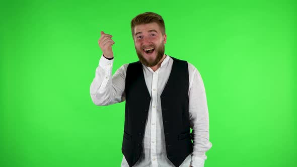 Man Waving Hand and Showing Gesture Come Here. Green Screen alt