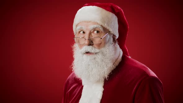 Funny Santa Claus Making Shhh Gesture alt