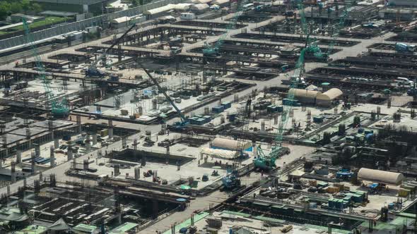 Time Lapse of Construction Site with Heavy Construction Machinery in Metropolis alt