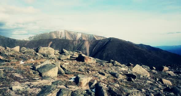 Aerial of Alpic Landscape From above.An Alpic Pass Landscape,a Dry Harsh Rocky Terrain with Tall