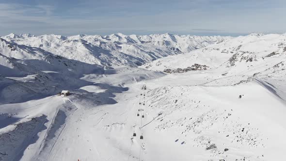 Winter Mountain Resort Lifts and Houses of Incredible Beauty. Mountains in the Snow alt