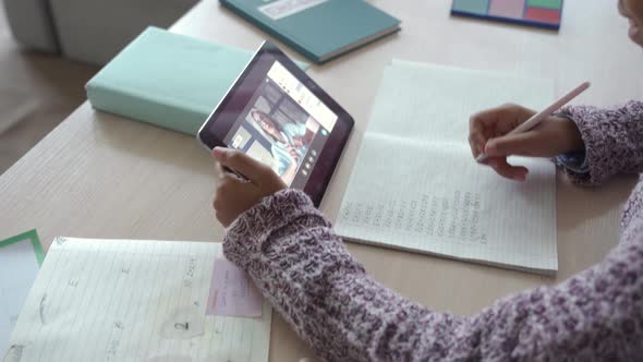 African Child Girl Holding Tablet Talking with Teacher on Distance Video Call alt