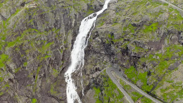 Top View Of The Famous Stigfossen Waterfall At Trollstigen In More Og Romsdal County, Norway. aerial alt