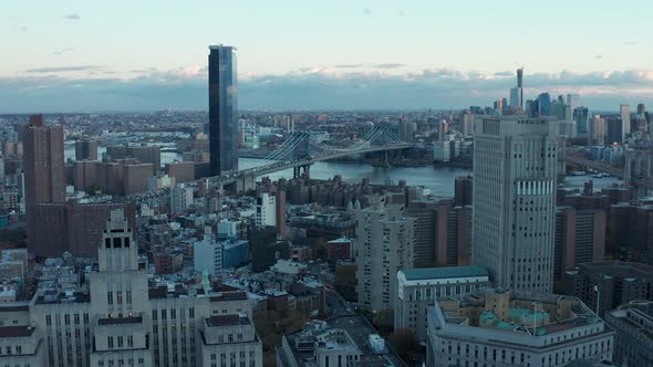 Aerial Descending Shot of Cityscape with Manhattan Bridge alt