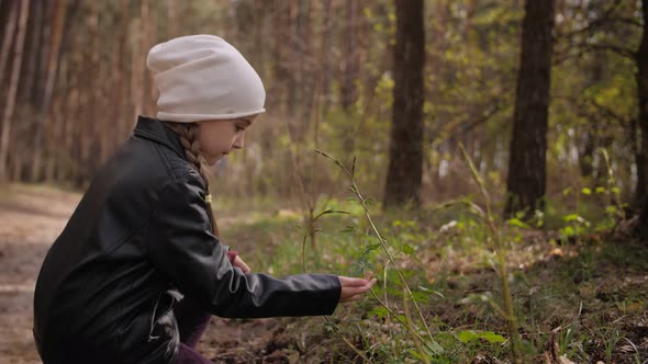 A Young Girl Wearing Leather Jacket in a Forest Study Flora