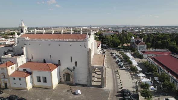 Aerial drone circling view of St. Francis or Sao Francisco gothic church in Evora, Portugal