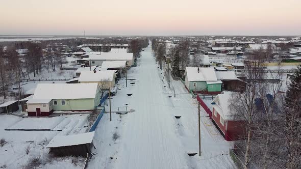 Severe Snowy Winter in a Village in the Far North Small Wooden Houses in the Snow