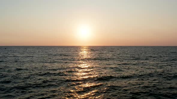 View of the Ocean, Fishing Boat and the Rising Sun. Sri Lanka Island