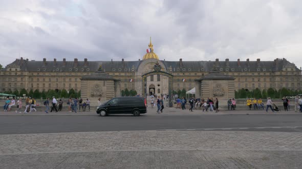 Entry gates of Les Invalides with people walking in and out Paris, France alt