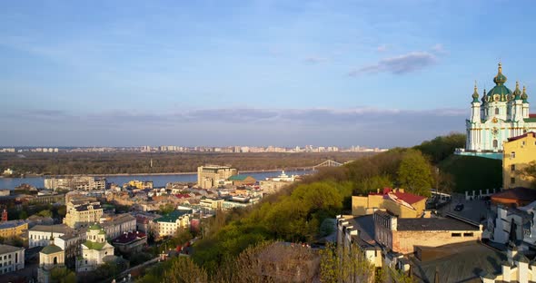 Aerial View Kyiv Cityscape Left Bank Dnipro River at Beautiful Sunset or Sunrise alt