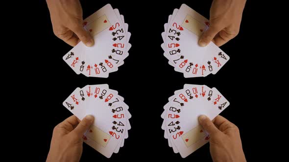 Hand holding cards at casino gambling