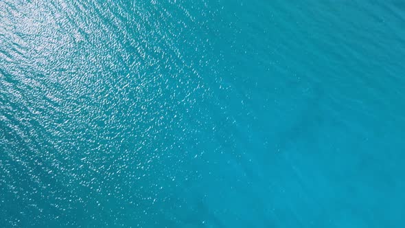 aerial drone footage looking Straight down of boats moored in the turquoise water of Lake Tahoe alt