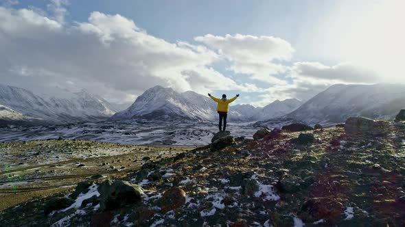 Successful Young Man Standing On Top Of Mountain Edge Snow Winter Extreme Conditions Success Achieve alt