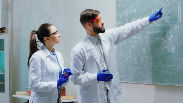 In the Chemistry Laboratory Man Scientist and His alt