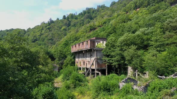 Ruined Lost Overgrown Mining Ghost Town Akarmara Consequences of War in Abkhazia Aerial View From alt
