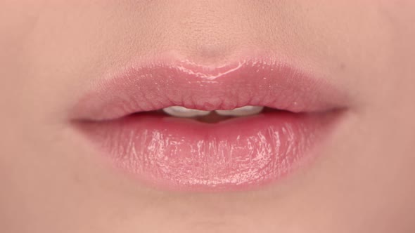Lips of a beautiful girl close up
