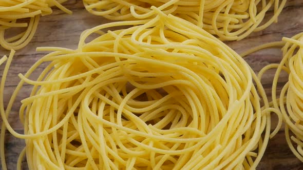 Italian rolled fresh fettuccine pasta. Spaghetti Tagliatelle nests
