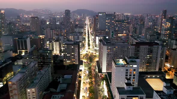 Panning wide landscape of coast city of Santos state of Sao Paulo Brazil. alt