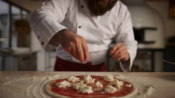 Kitchen Chef Cooking Pizza in Professional Restaurant alt