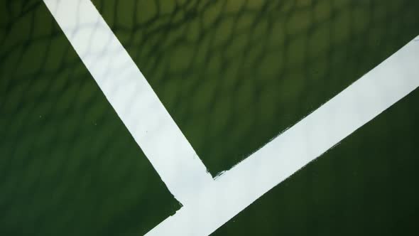 Tennis ball bouncing on white line in court 4k alt