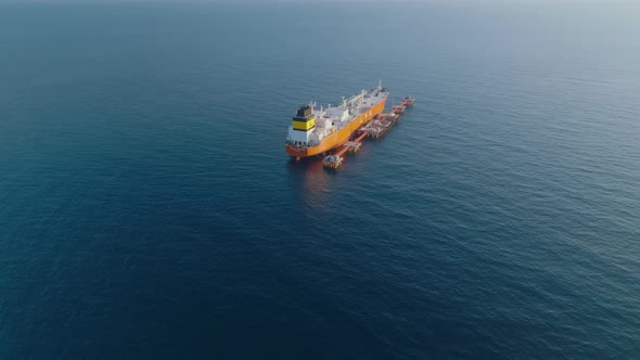 A gas tanker is anchored at sea aerial view 4 K alt